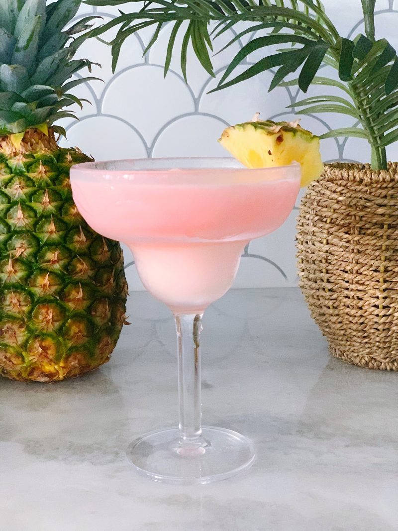 Chi Chi or chichi frozen drink in a cocktail glass with pineapple garnish