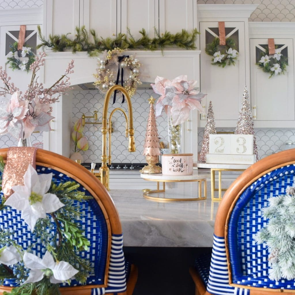 Modern kitchen decorated for Christmas in blush pink and gold