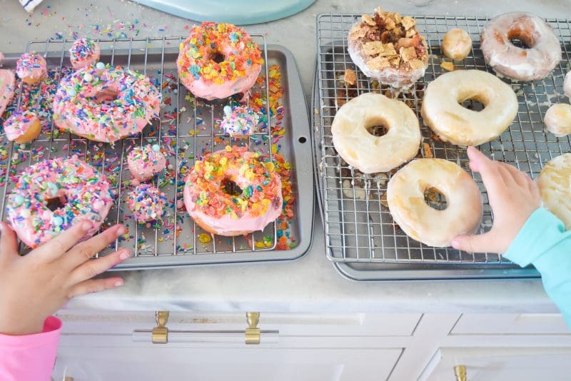 homemade donuts with cereal toppings