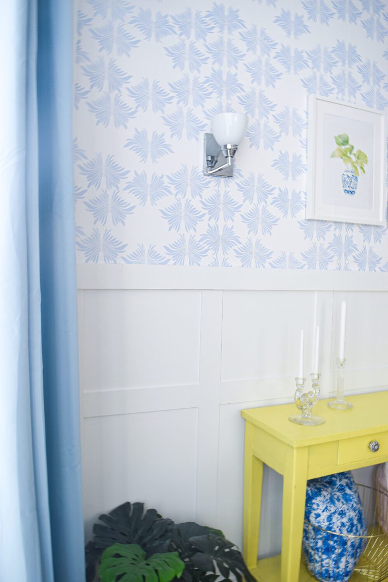blue and white wallpaper and white board and batten wall