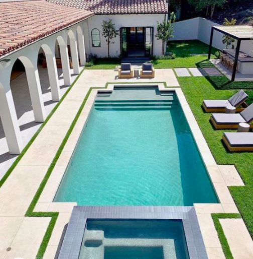 rectangle pool design with turf and concrete decking