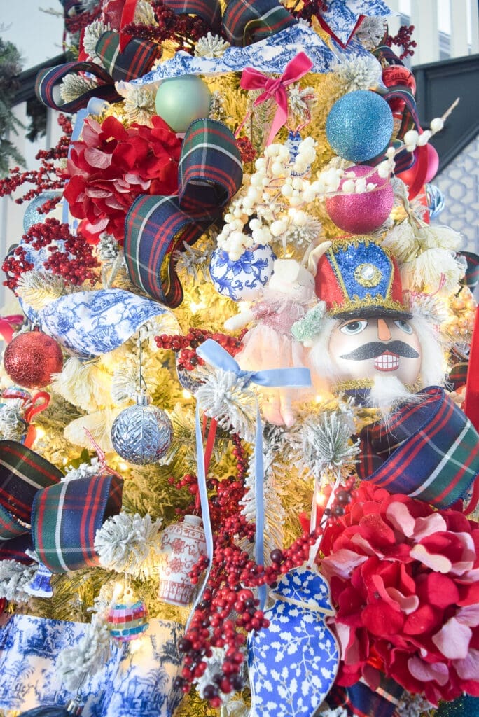 Chinoiserie Christmas Tree in Blue, Red, and Pink Uncover the secrets to styling a Chinoiserie Christmas tree in blue, red, and pink colors for a grand and sophisticated holiday display.